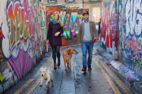 Co-founders Niall Harbison and Emma Jane Power with their four-legged friends Buster and Nina
